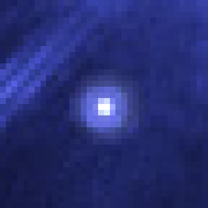 Magnified detail of Sirius B, a faint white dwarf with a small diffraction ring.